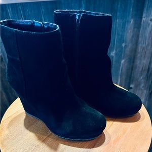 Pegabo black suede platform booties.